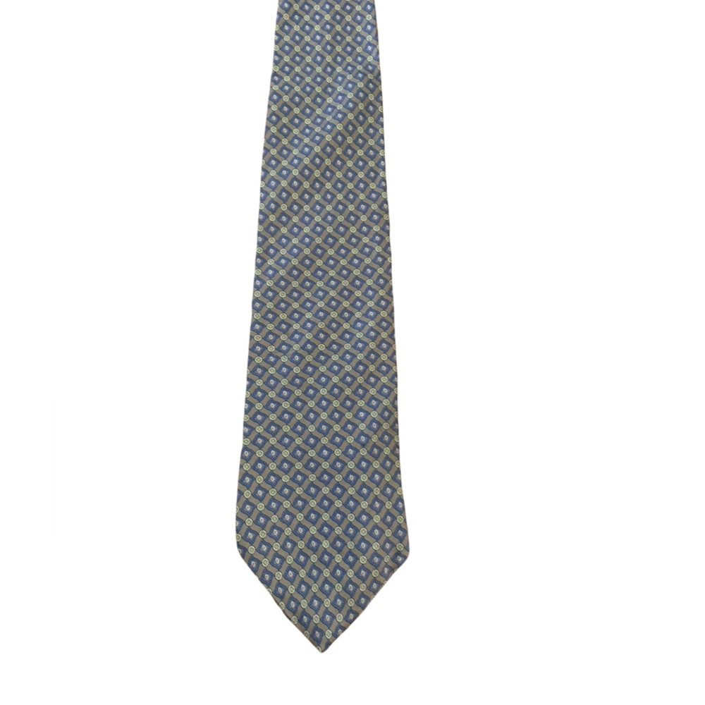 Morgan Hart 100% silk tie. Small allover geometric print on tan background. EUC